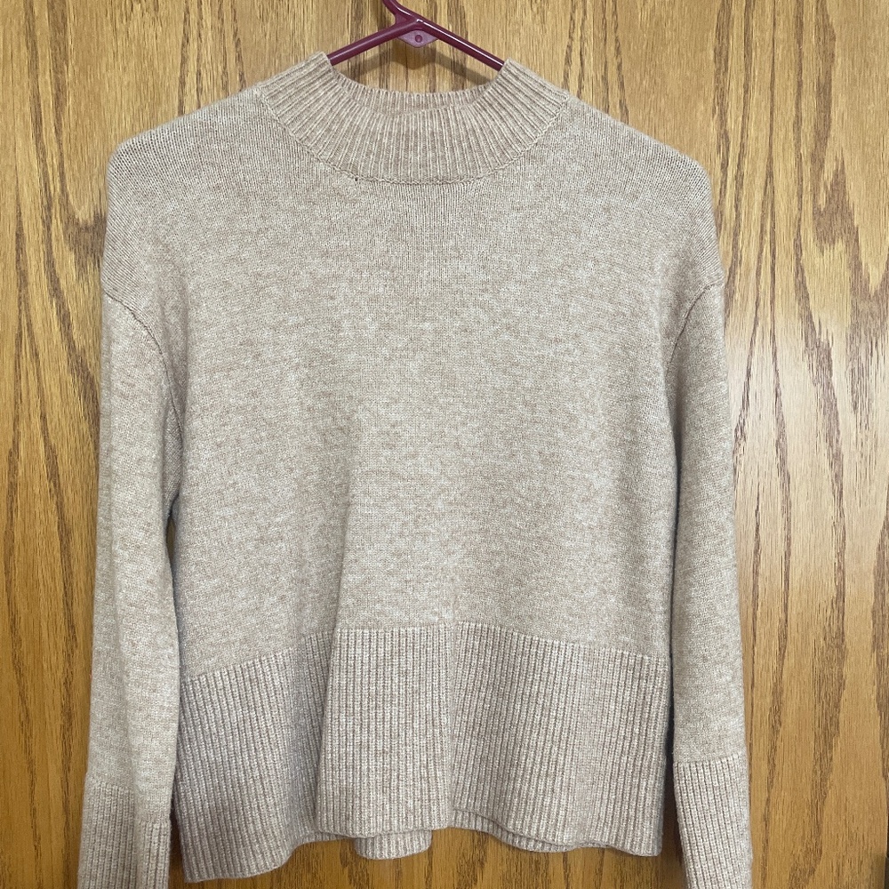 Cute beige sweater with bell sleeves